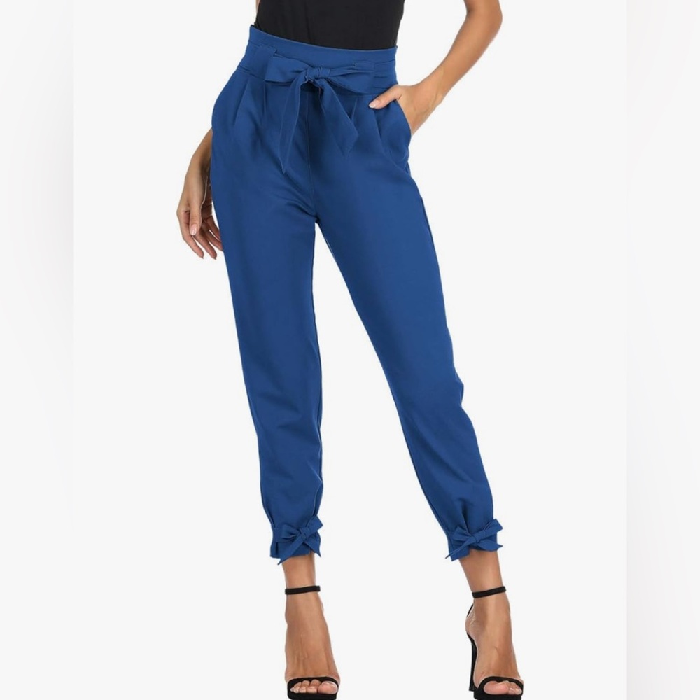 Blue paper bag pants with bow details